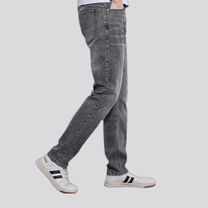 Abraded stonewashed slim men's jeans